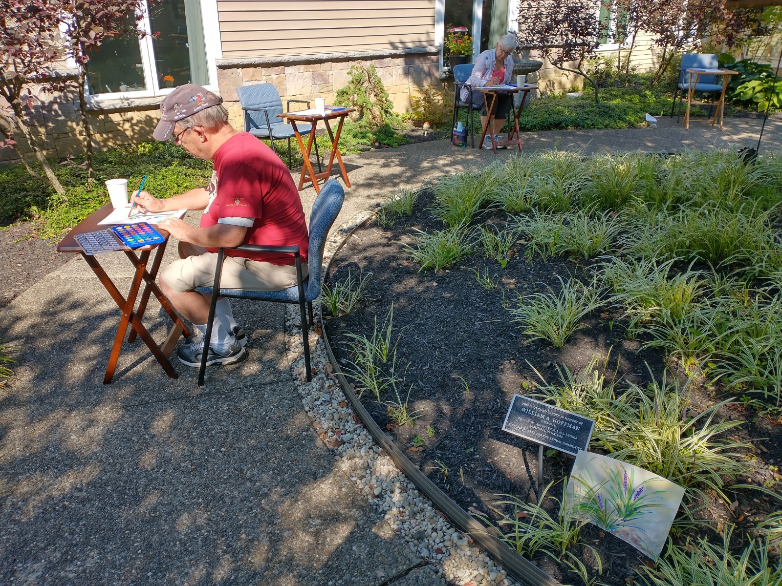 Otterbein Granville residents plein air painting in The Courtyard.