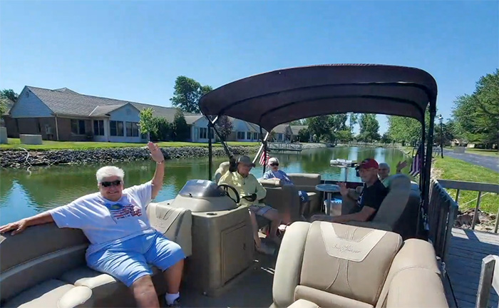 Sisters Sandy and Judy on a pontoon ride.