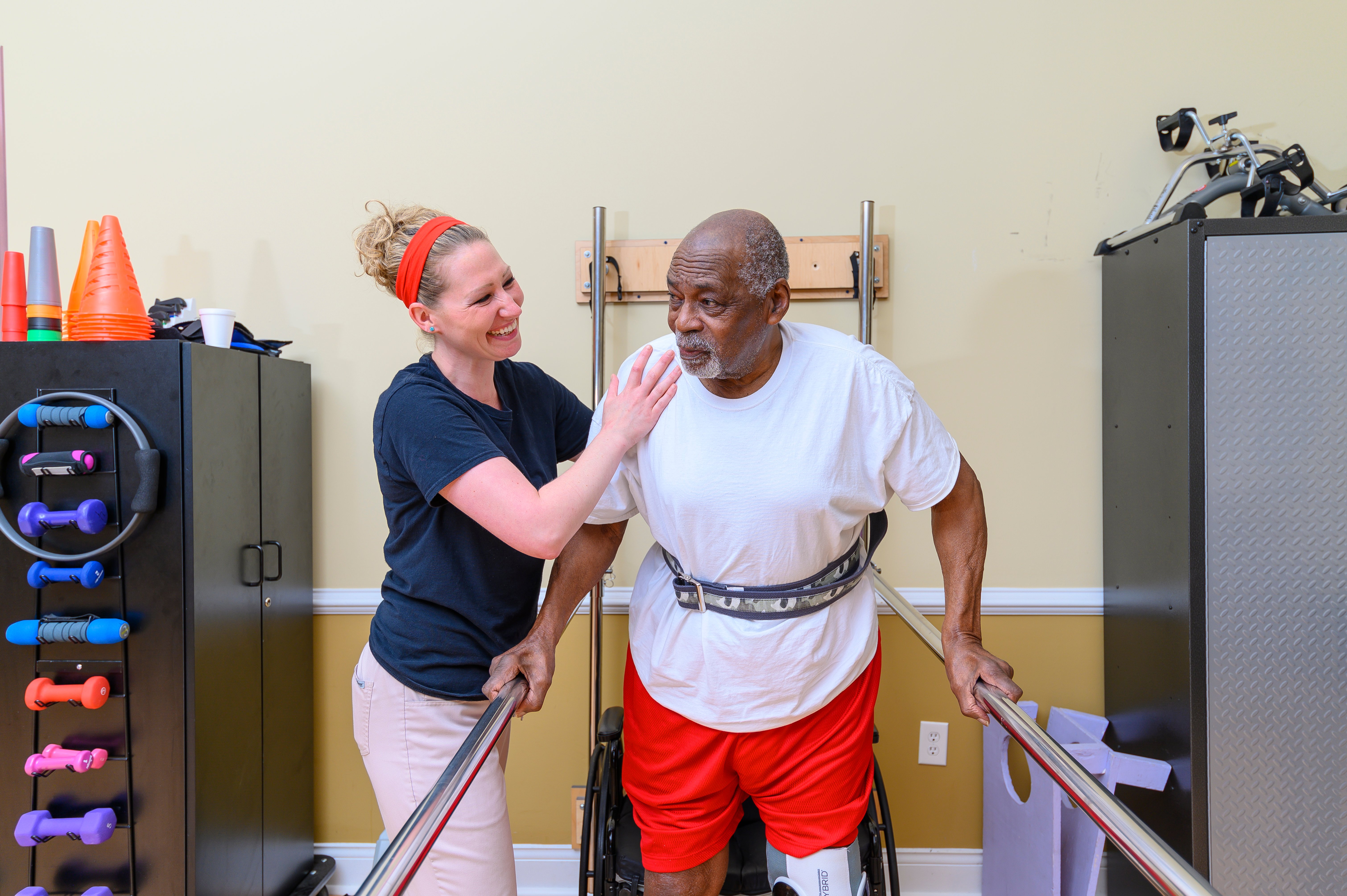 man receiving physical therapy from Otterbein staff.