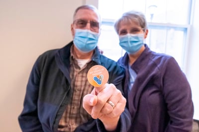 Otterbein residents with a vaccinated sticker
