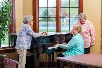 Residents at a piano