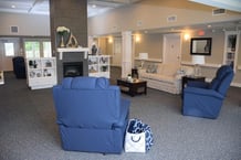 Otterbein SeniorLife Small House Neighborhood family room with central hearth.
