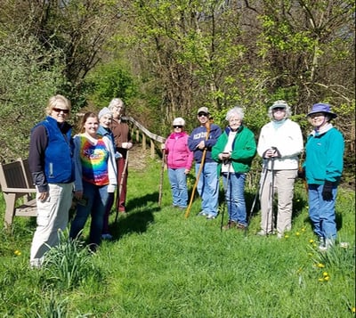 Otterbein Granville residents go on a wildflower hike on the campus in the springtime.
