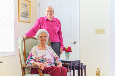 Senior man visits his wife in assisted living