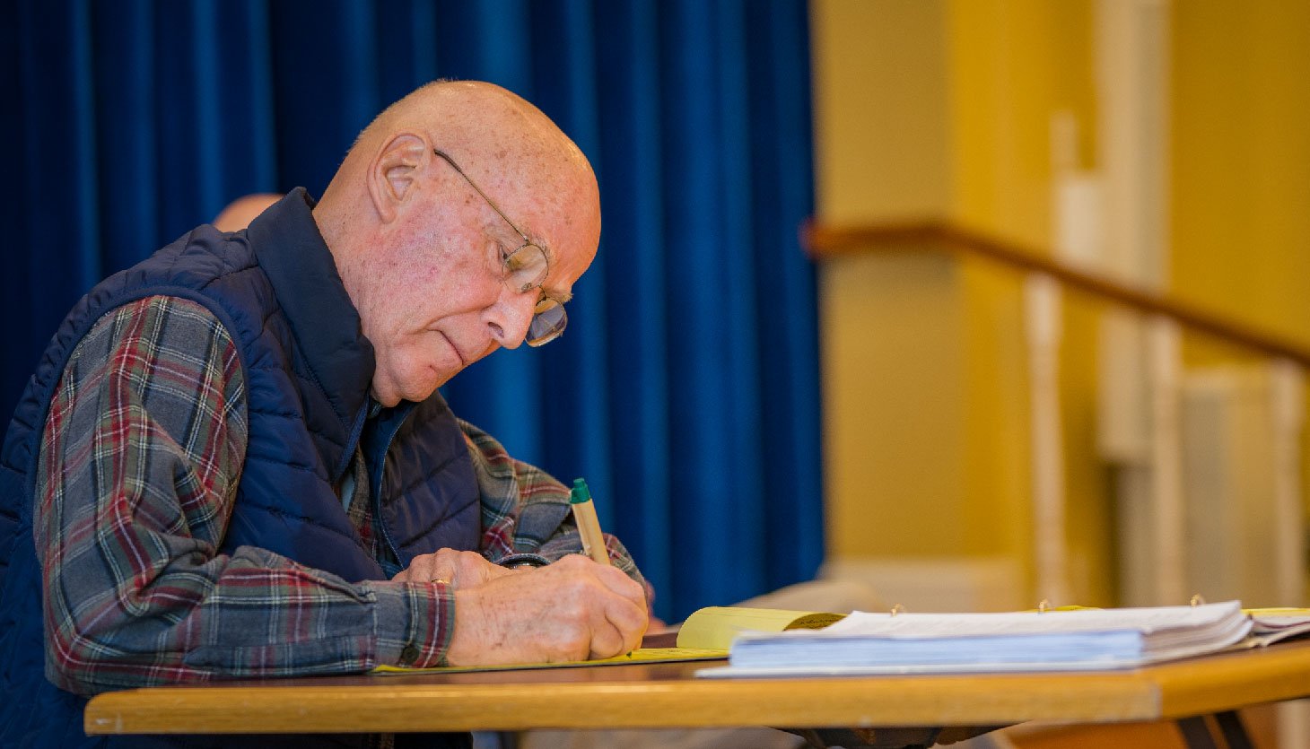 Otterbein Granville resident writing on document