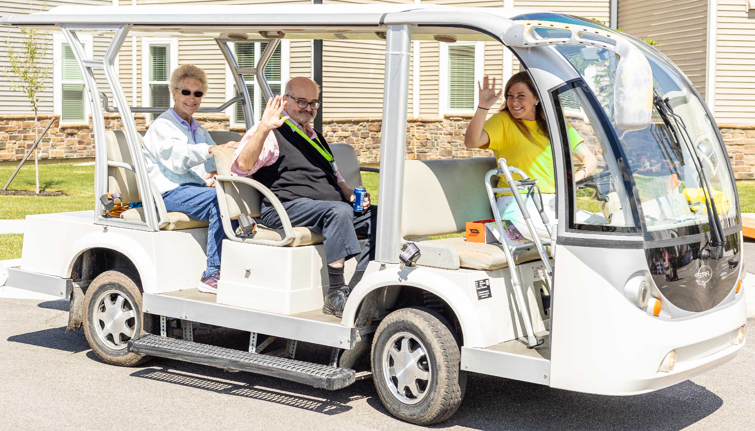 Otterbein Pemberville residents on a golf cart