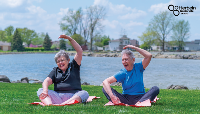 Two Otterbein St. Marys residents doing yoga.