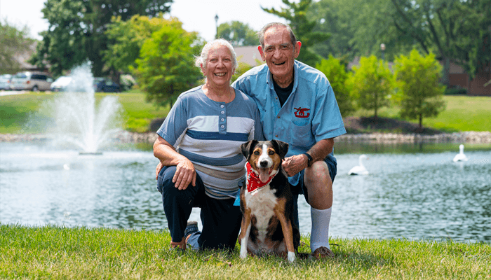 Otterbein SeniorLife residents with their dog.